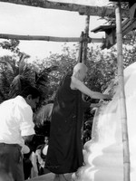 Ven Mettavihari placing Casket